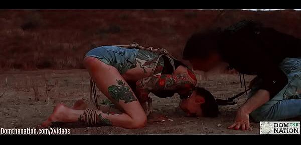  Ass eating bondage slave cries while her feet get caned outdoors in the dirt - Rocky Emerson